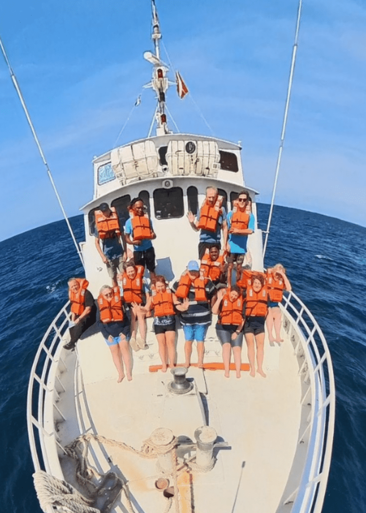 People practicing a safety drill on a boat
Caribbean Explorer II, 